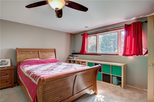 4884 Priory Rd, Eau Claire, WI 54701 - bedroom with a ceiling fan and light carpet