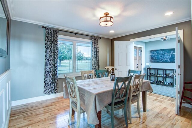 4884 Priory Rd, Eau Claire, WI 54701 - dining room featuring baseboards, recessed lighting, light wood-style flooring, and ornamental molding