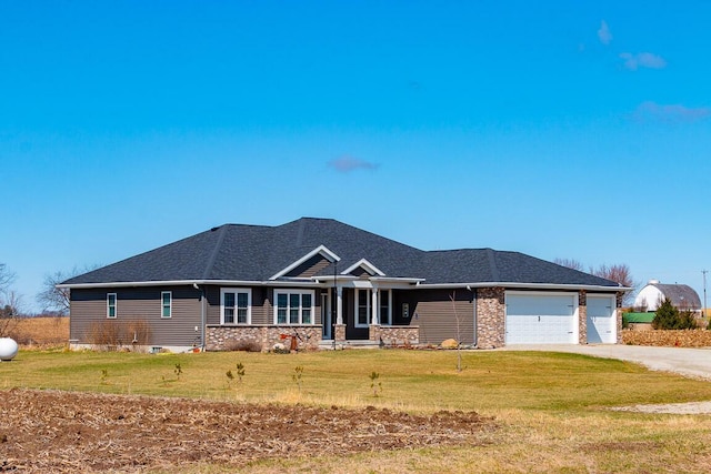 N9429 Horseshoe Rd, Watertown, WI 53094 - view of front of home featuring an attached garage, concrete driveway, and a front yard