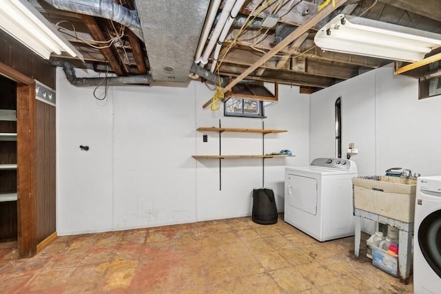 washroom with washer / dryer and laundry area