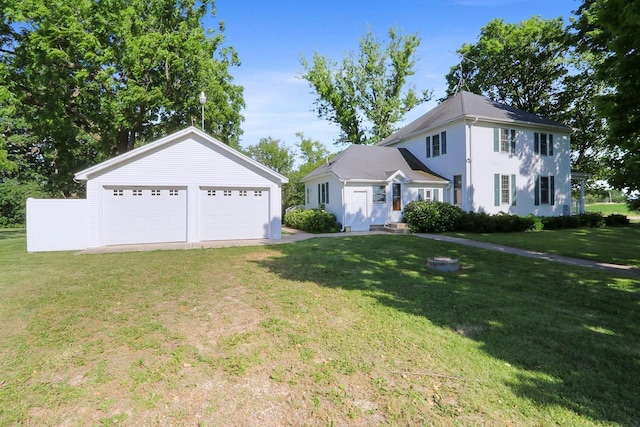 W512 Hafs Rd, Genoa City, WI 53128 - colonial home with an outbuilding, a garage, and a front lawn