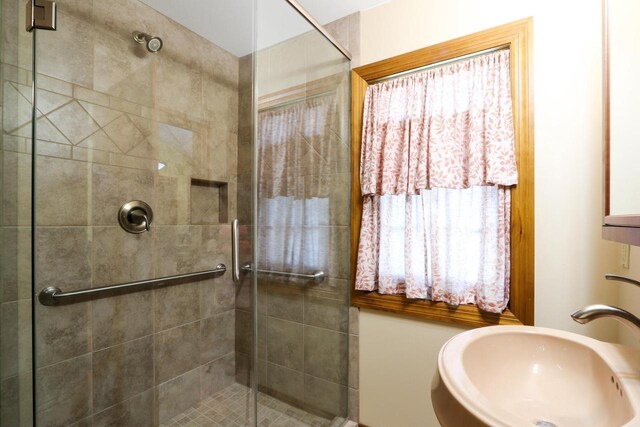 W512 Hafs Rd, Genoa City, WI 53128 - bathroom featuring a stall shower and a sink