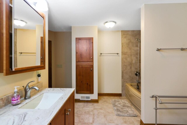 W512 Hafs Rd, Genoa City, WI 53128 - bathroom featuring baseboards, visible vents, vanity, and bathing tub / shower combination