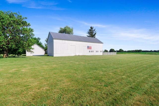 W512 Hafs Rd, Genoa City, WI 53128 - view of yard featuring an outdoor structure and a pole building