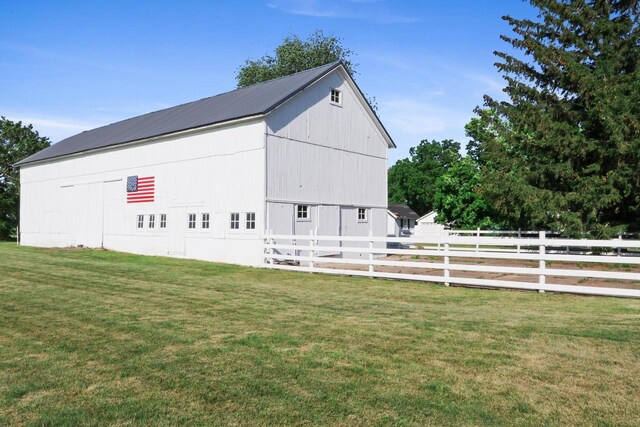 W512 Hafs Rd, Genoa City, WI 53128 - view of barn featuring fence and a yard