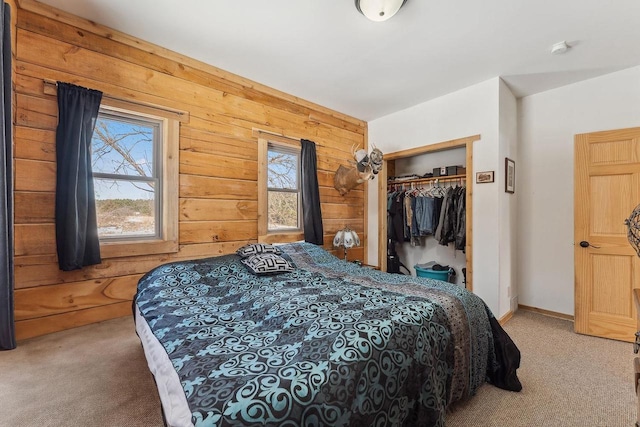 N9805 County Road Aa, Portage, WI 53901 - bedroom featuring carpet floors, multiple windows, wood walls, and a closet