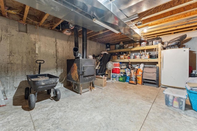 N9805 County Road Aa, Portage, WI 53901 - unfinished below grade area with a wood stove