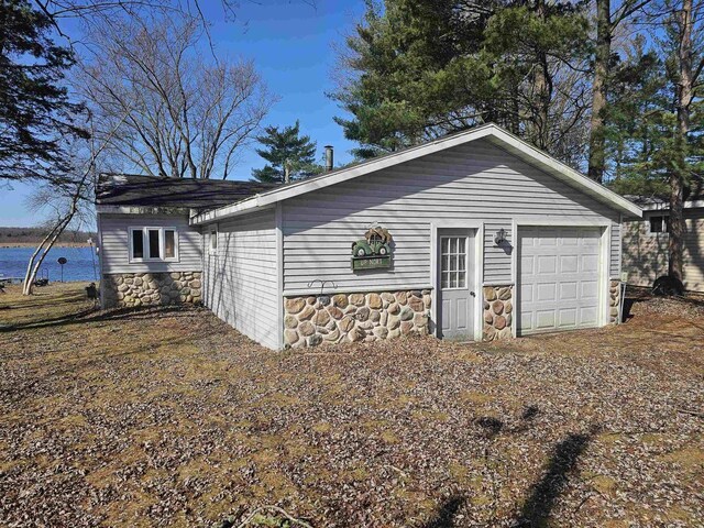 N2709 Lakeshore Dr, Montello, WI 53949 - garage featuring a water view