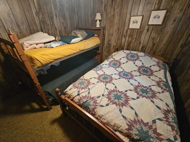 N2709 Lakeshore Dr, Montello, WI 53949 - bedroom with wooden walls and carpet floors