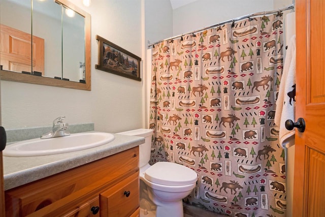 W7113 Bighorn Ct, Wautoma, WI 54982 - full bathroom with toilet, vanity, and a shower with shower curtain