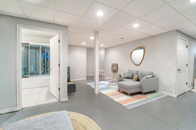W7113 Bighorn Ct, Wautoma, WI 54982 - interior space featuring a drop ceiling, concrete floors, baseboards, and recessed lighting