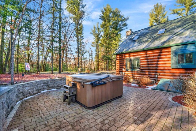 W7113 Bighorn Ct, Wautoma, WI 54982 - view of patio / terrace with a hot tub