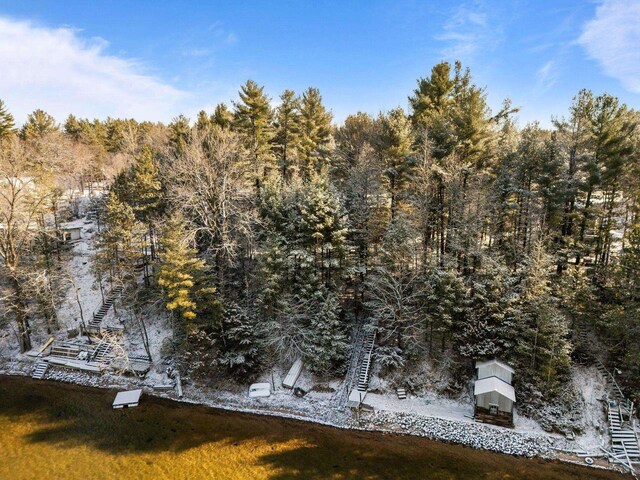 aerial view featuring a view of trees