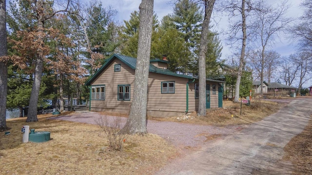 W13573 S Pleasant Rd, Westfield, WI 53964 - view of side of property with a chimney