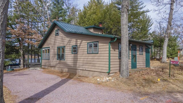 W13573 S Pleasant Rd, Westfield, WI 53964 - view of side of home with a chimney