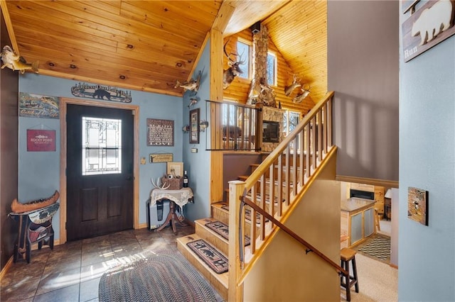 6825 W Lakewood Blvd, Ladysmith, WI 54848 - tiled foyer featuring stairs, beamed ceiling, high vaulted ceiling, and wood ceiling