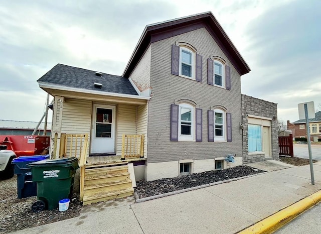 312 S Pearl St, New London, WI 54961 - view of front of house featuring brick siding