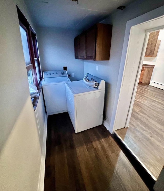 312 S Pearl St, New London, WI 54961 - laundry area with independent washer and dryer, cabinet space, dark wood-type flooring, and baseboards