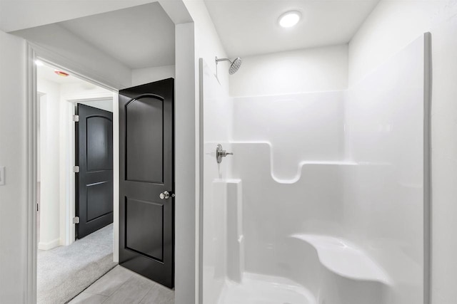 2421 Creeksedge Way, De Pere, WI 54115 - bathroom featuring a shower and baseboards