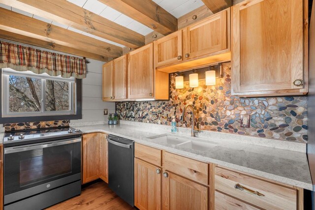 9614 Mississippi Ln, Bagley, WI 53801 - kitchen featuring beam ceiling, a sink, light brown cabinetry, appliances with stainless steel finishes, and decorative backsplash