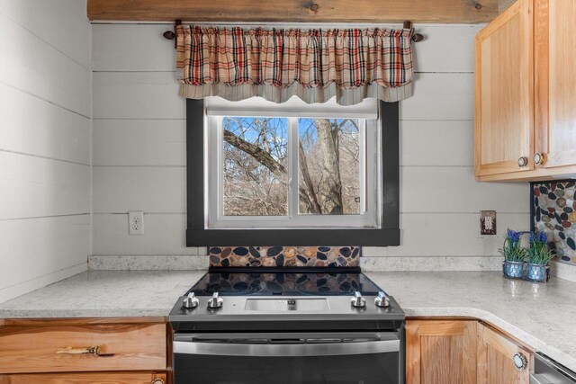 9614 Mississippi Ln, Bagley, WI 53801 - kitchen featuring light countertops, light brown cabinets, and stainless steel range with electric cooktop