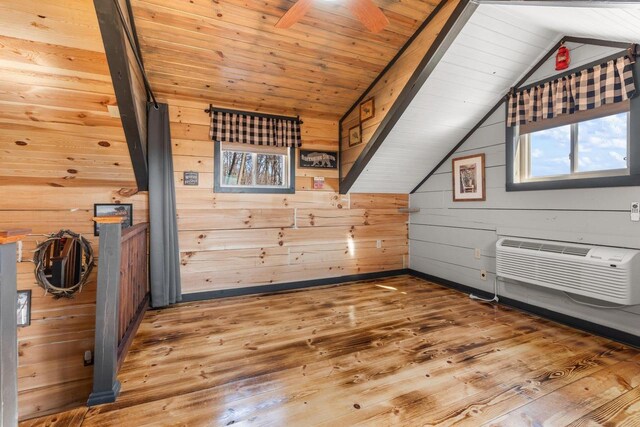 9614 Mississippi Ln, Bagley, WI 53801 - bonus room with wood walls, wood finished floors, a wall unit AC, vaulted ceiling, and wood ceiling