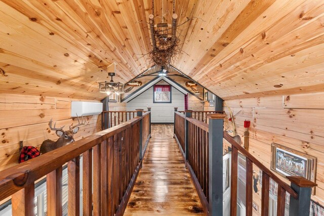 9614 Mississippi Ln, Bagley, WI 53801 - corridor featuring an upstairs landing, vaulted ceiling, wood ceiling, wooden walls, and wood finished floors