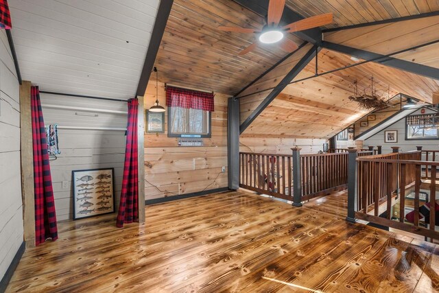 9614 Mississippi Ln, Bagley, WI 53801 - bonus room featuring wood walls, wooden ceiling, ceiling fan, vaulted ceiling with beams, and wood finished floors