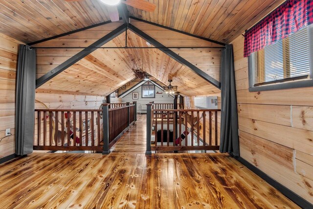 9614 Mississippi Ln, Bagley, WI 53801 - bonus room featuring vaulted ceiling with beams, wooden walls, wooden ceiling, and wood-type flooring