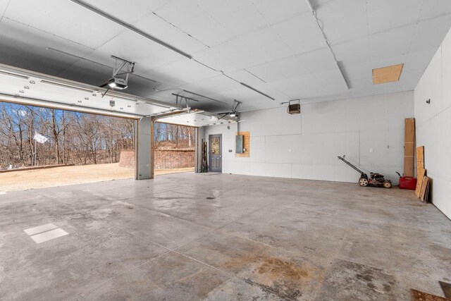9614 Mississippi Ln, Bagley, WI 53801 - garage featuring electric panel and a garage door opener