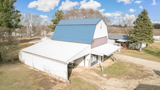 N6741 S Center Rd, Beaver Dam, WI 53916 - view of barn with driveway and a yard