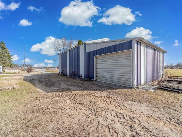 N6741 S Center Rd, Beaver Dam, WI 53916 - garage featuring driveway