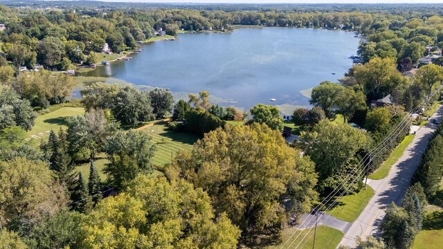 2548 Wallace Lake Rd, West Bend, WI 53090 - drone / aerial view featuring a water view and a view of trees