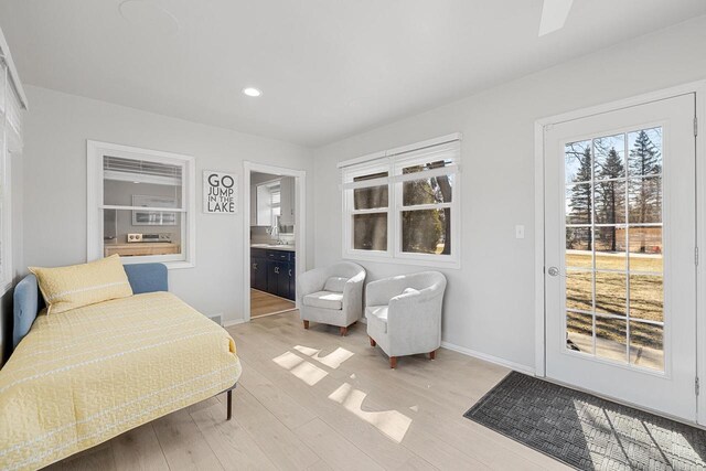 2548 Wallace Lake Rd, West Bend, WI 53090 - interior space with baseboards, light wood-style flooring, recessed lighting, and access to outside