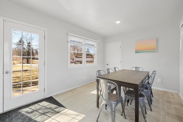 2548 Wallace Lake Rd, West Bend, WI 53090 - dining room featuring baseboards, light wood-style flooring, and recessed lighting