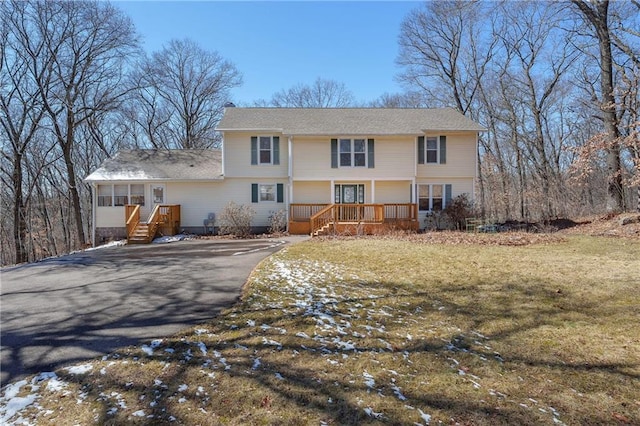 7822 Blue Valley Dr, Eau Claire, WI 54703 - view of front of property featuring aphalt driveway and a front lawn