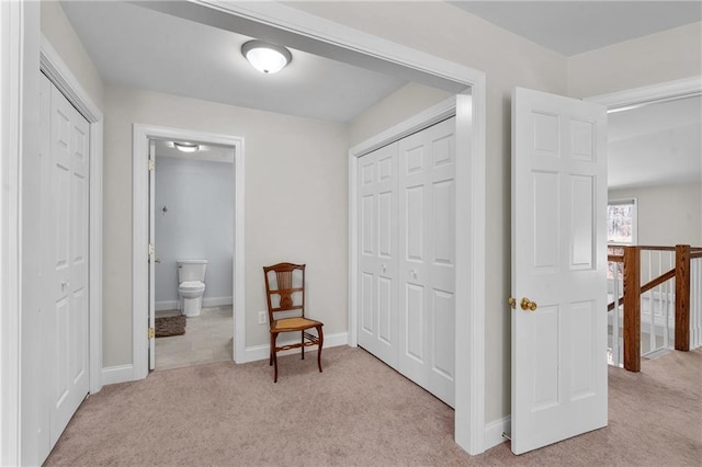 7822 Blue Valley Dr, Eau Claire, WI 54703 - hallway featuring light colored carpet and baseboards