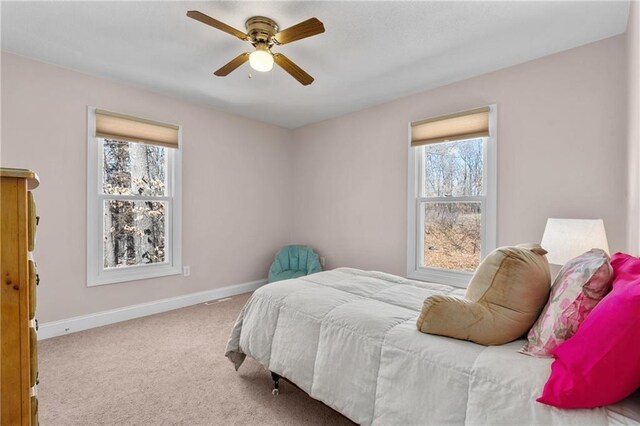7822 Blue Valley Dr, Eau Claire, WI 54703 - bedroom featuring carpet flooring, baseboards, and ceiling fan