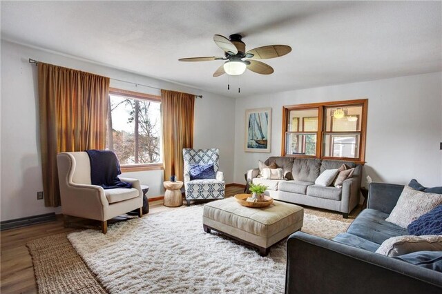 E5512 784th Ave, Menomonie, WI 54751 - living area featuring baseboards, ceiling fan, and wood finished floors