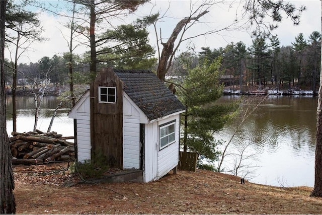 E5512 784th Ave, Menomonie, WI 54751 - view of shed featuring a water view and a view of trees