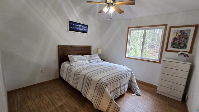 84195 State Highway 13, Bayfield, WI 54814 - bedroom with baseboards, a ceiling fan, and wood finished floors