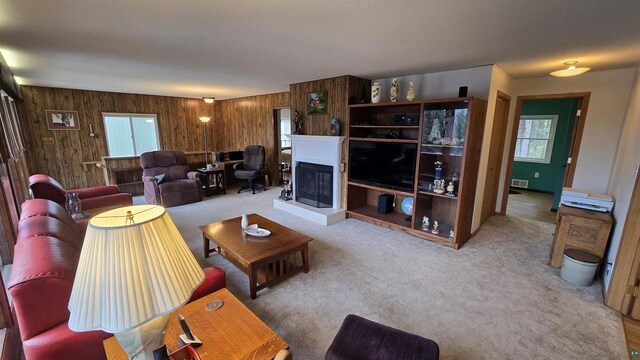 84195 State Highway 13, Bayfield, WI 54814 - living area with visible vents, wood walls, and light colored carpet