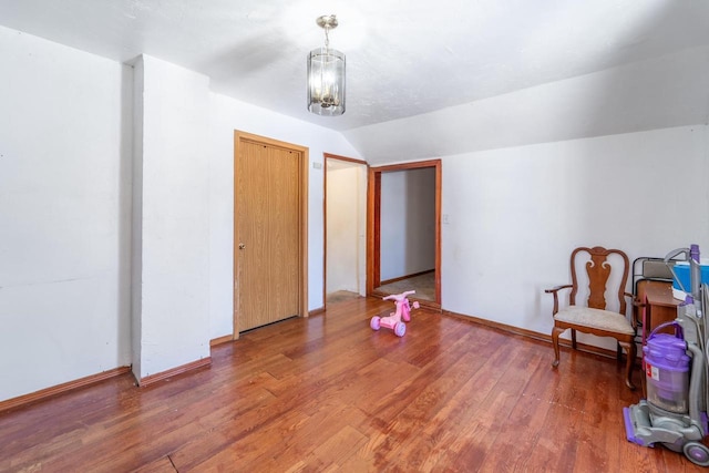 430 N 2nd Ave, Wausau, WI 54401 - sitting room featuring baseboards, lofted ceiling, and wood finished floors