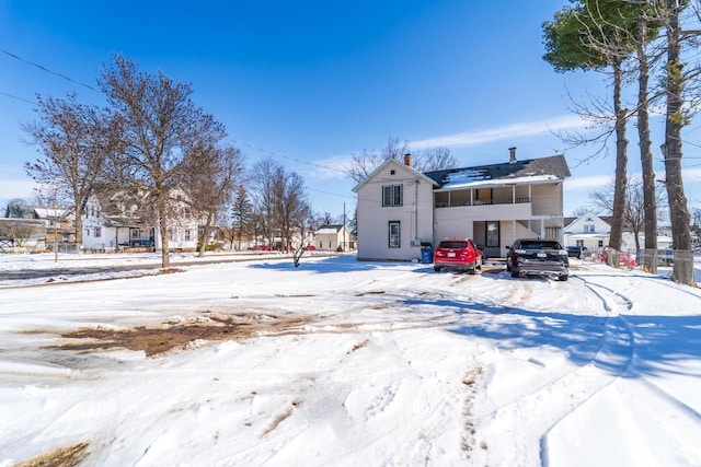 430 N 2nd Ave, Wausau, WI 54401 - snow covered house featuring a chimney