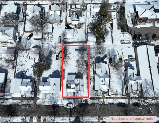 516 Hamilton St, Wausau, WI 54403 - snowy aerial view featuring a residential view