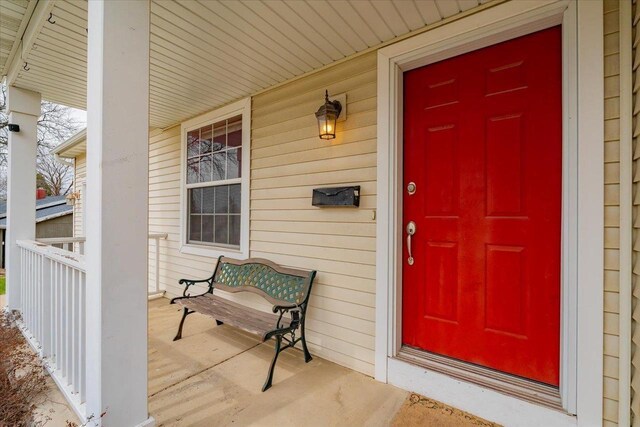 968 Pine St, Sun Prairie, WI 53590 - view of exterior entry featuring covered porch