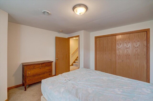 968 Pine St, Sun Prairie, WI 53590 - bedroom featuring baseboards, visible vents, a closet, and carpet flooring