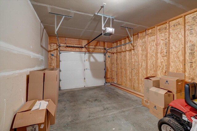 968 Pine St, Sun Prairie, WI 53590 - garage featuring a garage door opener