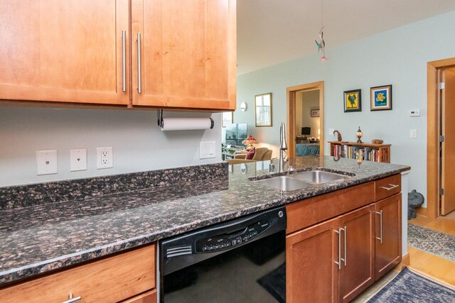 1550 E Royall Pl Unit 410, Milwaukee, WI 53202 - kitchen with black dishwasher, wood finished floors, a sink, and dark stone counters