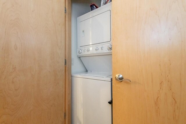 1550 E Royall Pl Unit 410, Milwaukee, WI 53202 - laundry room with laundry area and stacked washing maching and dryer